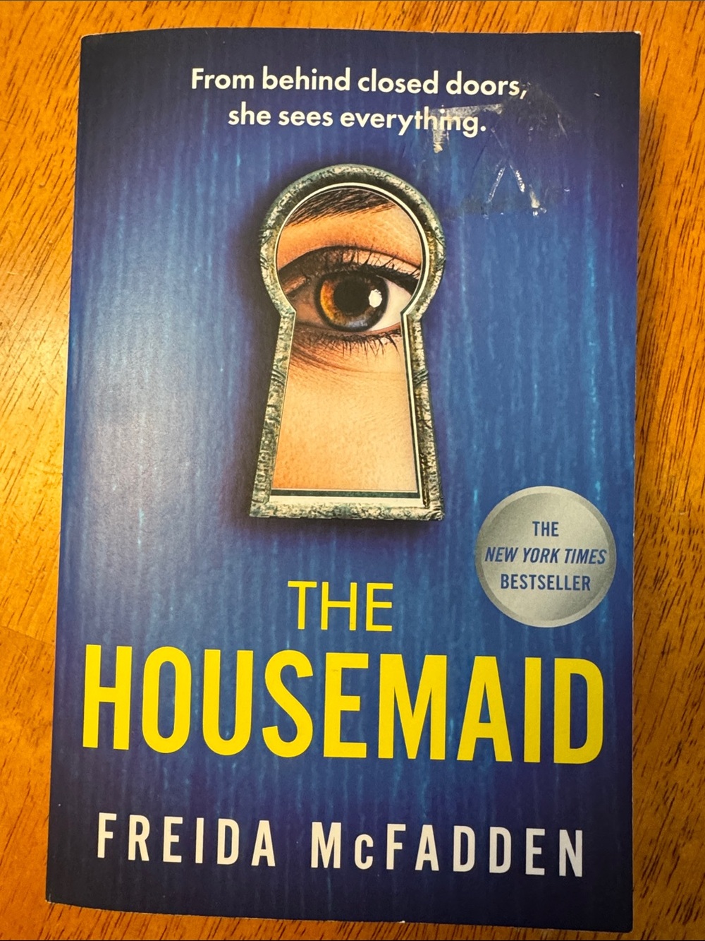 The Housemaid by Freida McFadden - Blue & Yellow Paperback